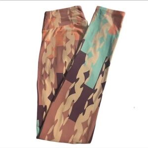 NWOT! Geometric leggings in Cream, Baby Blue, Purple, Gray, & Pink
